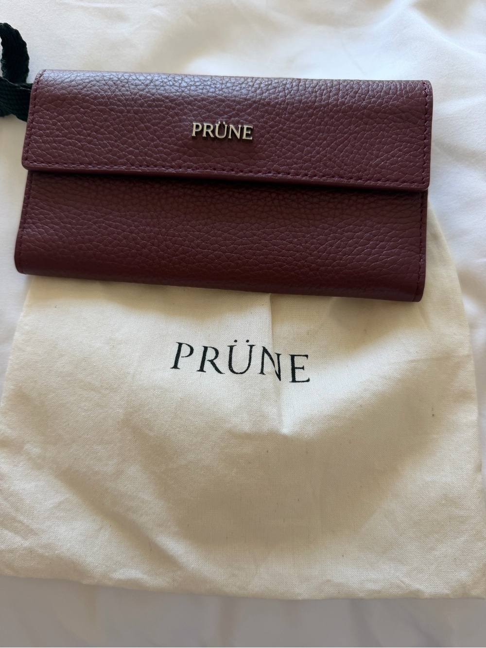 Argentine brand Prune Two-Tone Pebbled Leather Long Wallet in Burgundy and Mauve